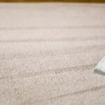 This is a photo of a carpet steam cleaner cleaning a cream carpet works carried out by Ruislip Carpet Cleaning Solutions