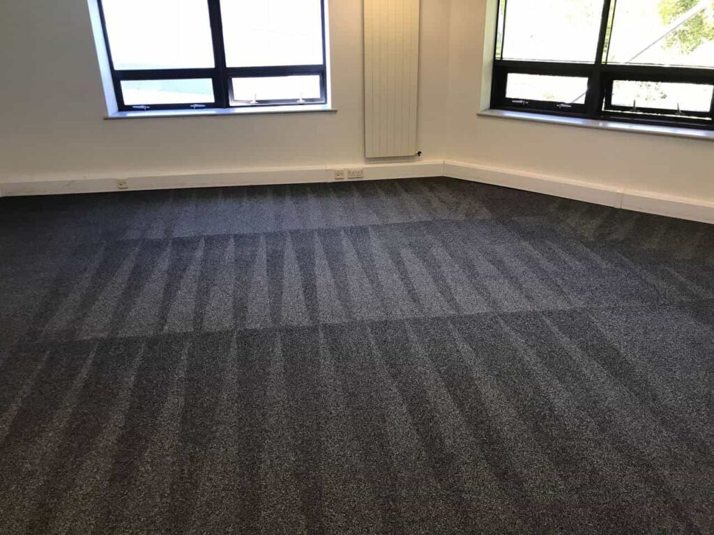 This is a photo of a grey office carpet that has just been professionally steam cleaned works carried out by Ruislip Carpet Cleaning Solutions