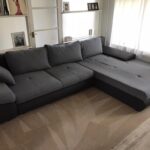 This is a photo of a grey L shape sofa that has been professionally steam cleaned, also the beige carpets have been steam cleaned too works carried out by Ruislip Carpet Cleaning Solutions